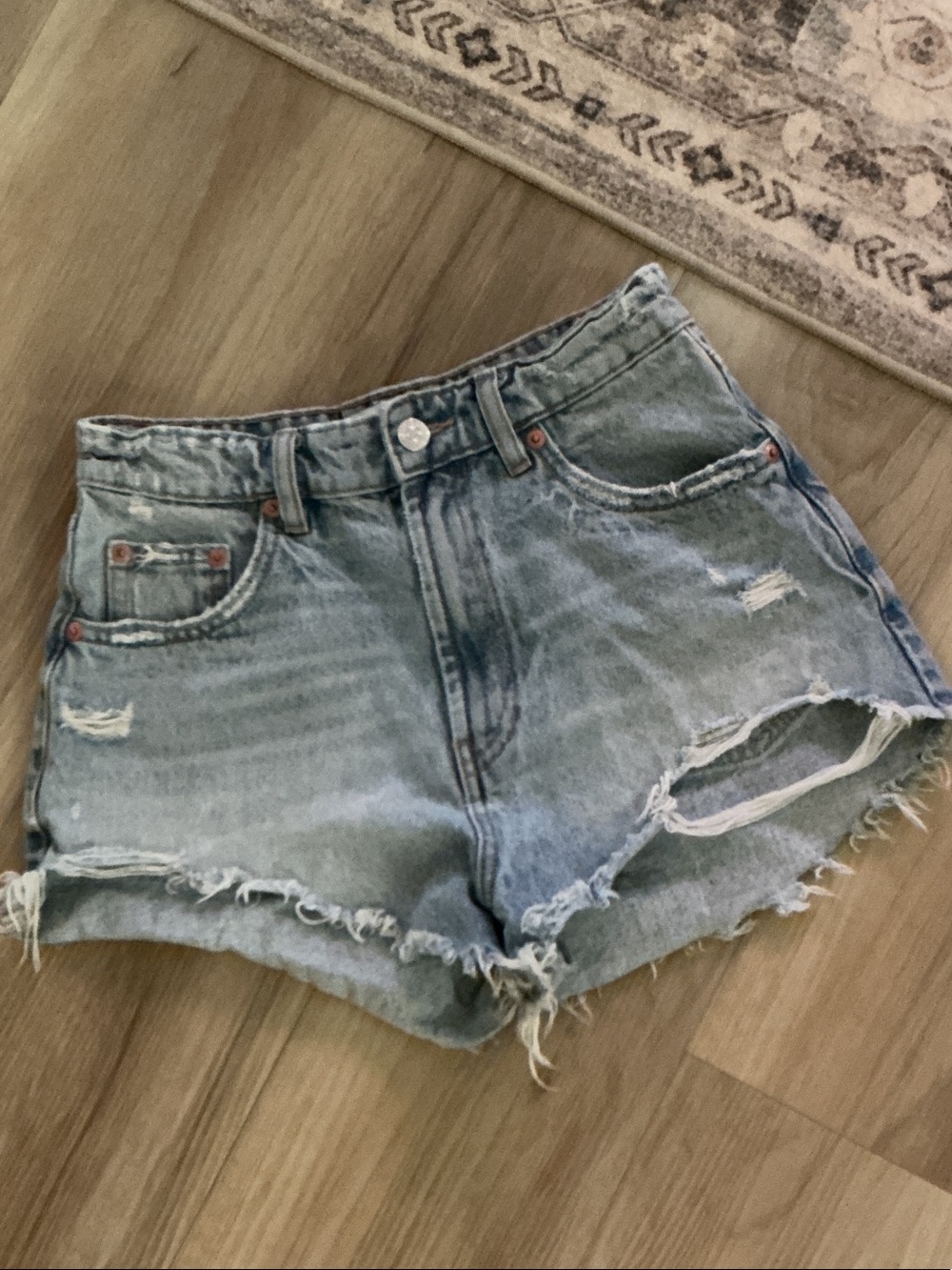 ZARA Faded Blue Distressed Denim Shorts, size 2.